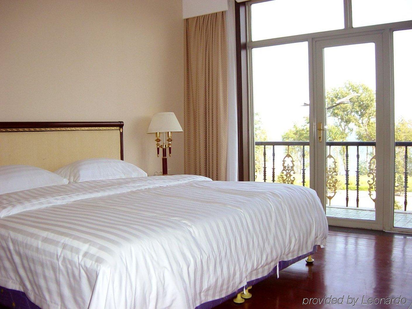 Gloria Holiday Villas Qinhuangdao Quarto foto